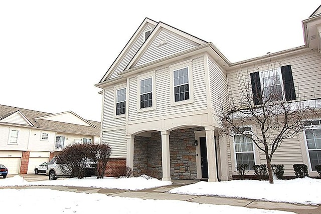 view of front of property with a garage