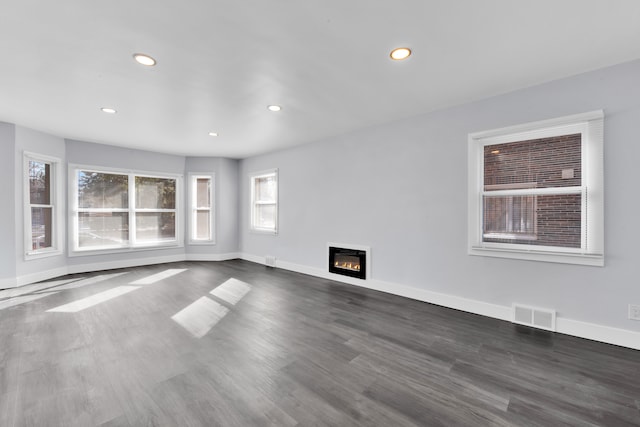 interior space with dark hardwood / wood-style floors