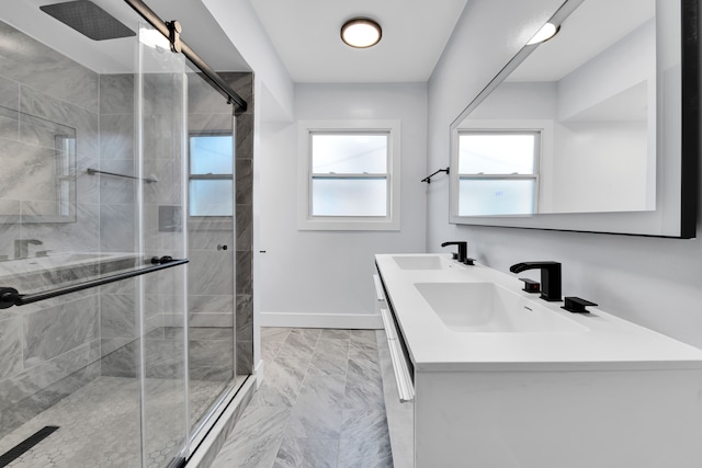 bathroom with vanity and an enclosed shower