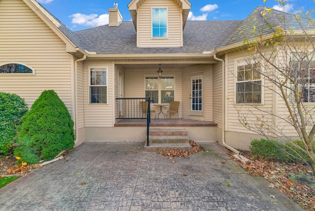 property entrance featuring covered porch