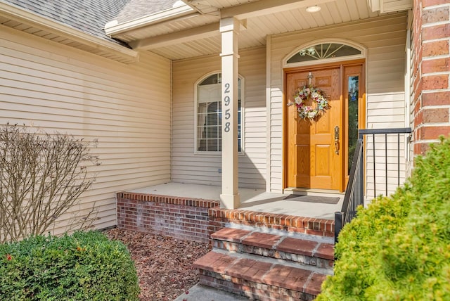 property entrance featuring covered porch