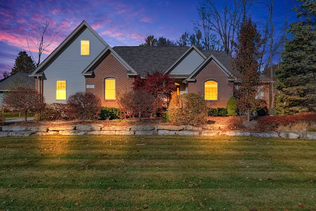 view of property featuring a yard