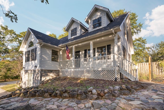 cape cod home with covered porch