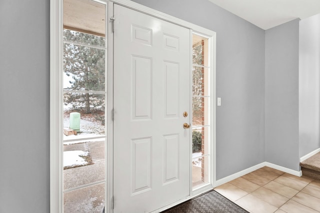 entrance foyer with tile patterned floors