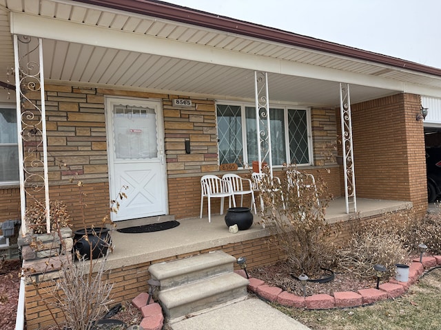 entrance to property with covered porch