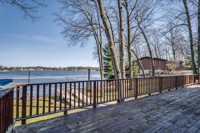 deck featuring a water view