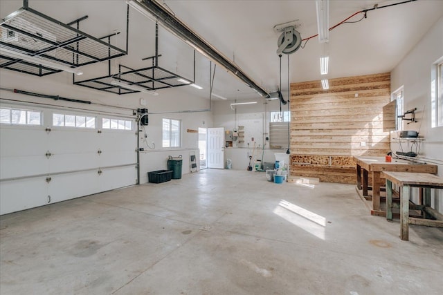 garage featuring wooden walls