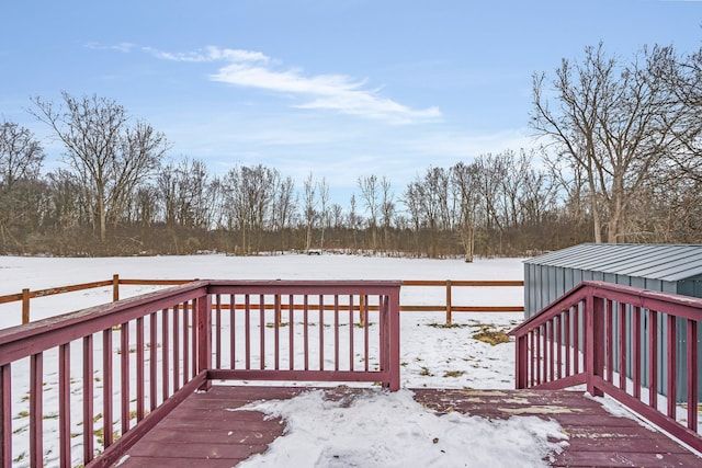 view of snow covered deck