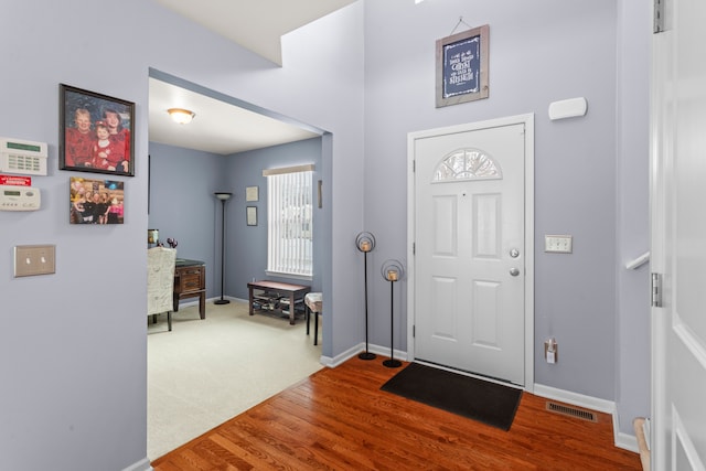 entrance foyer with hardwood / wood-style floors