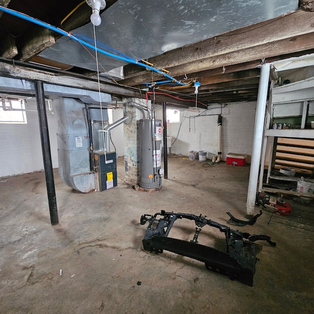 basement with heating unit and water heater