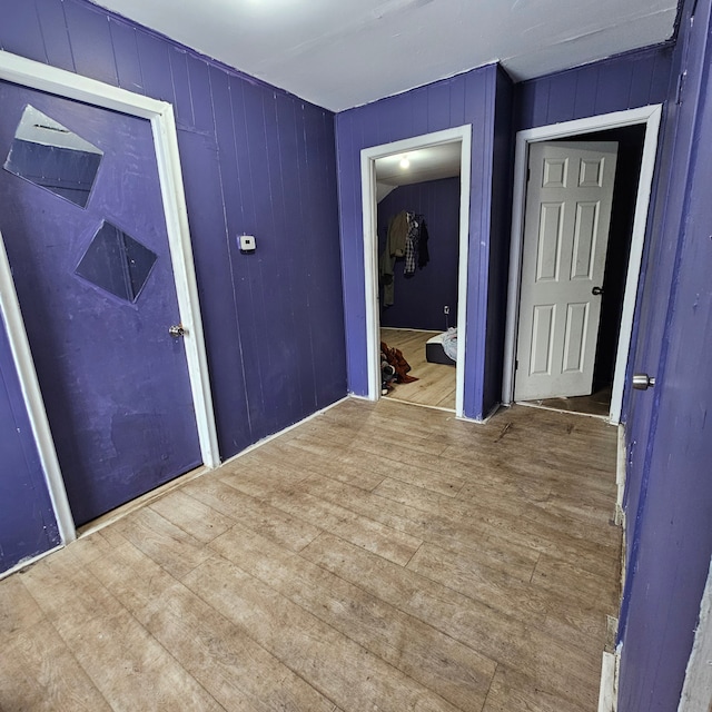 foyer entrance with hardwood / wood-style flooring