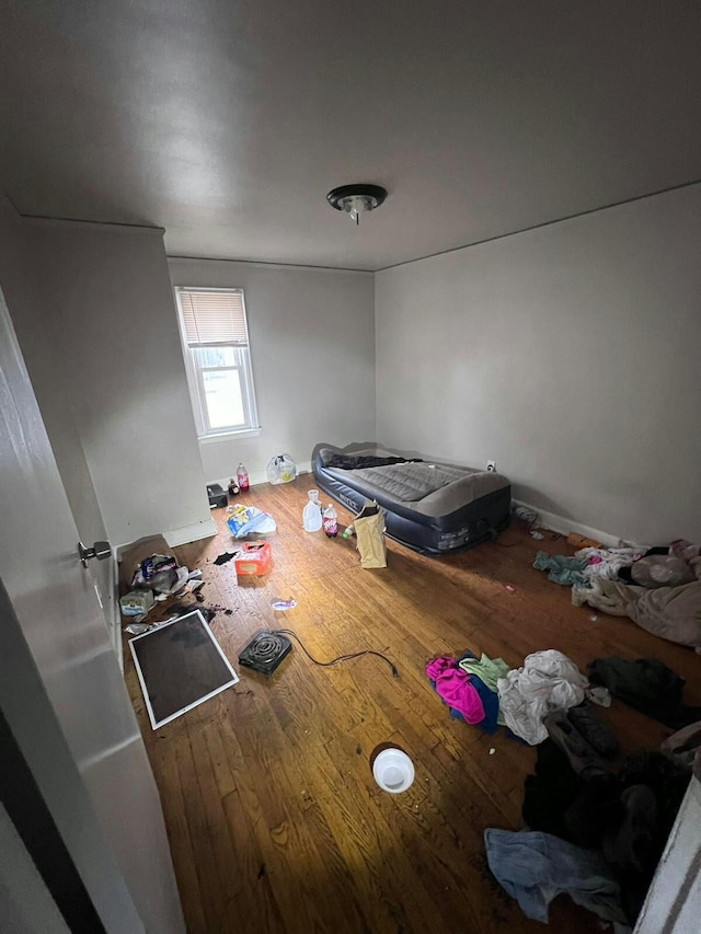 unfurnished bedroom featuring wood-type flooring