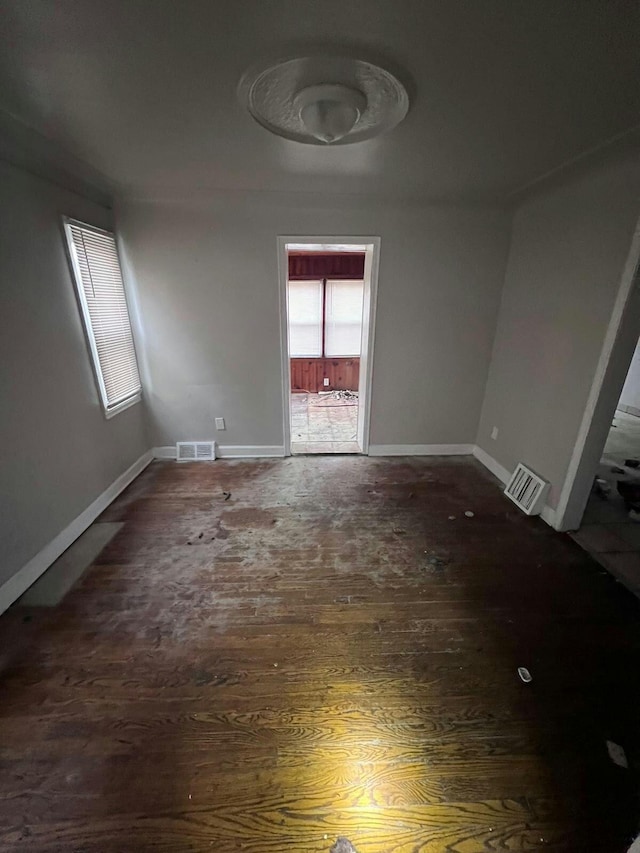 empty room featuring dark hardwood / wood-style floors