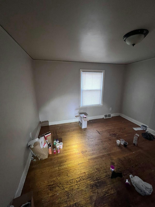 empty room featuring hardwood / wood-style floors