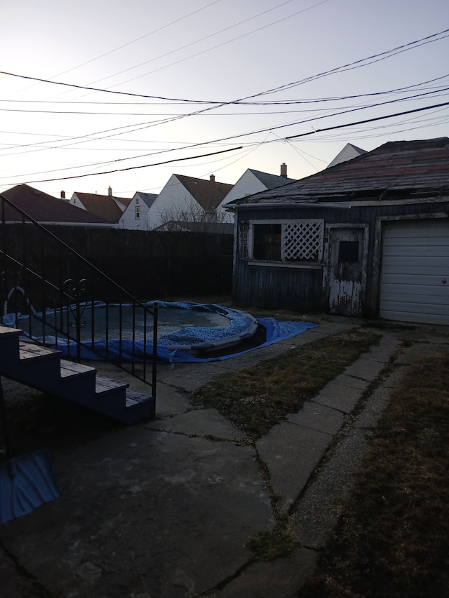 view of swimming pool with a fenced in pool and fence