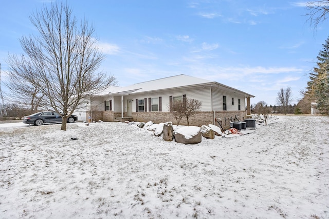 view of front of property featuring central AC unit