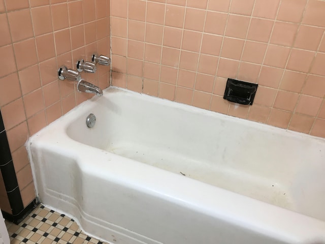 bathroom with a bathing tub