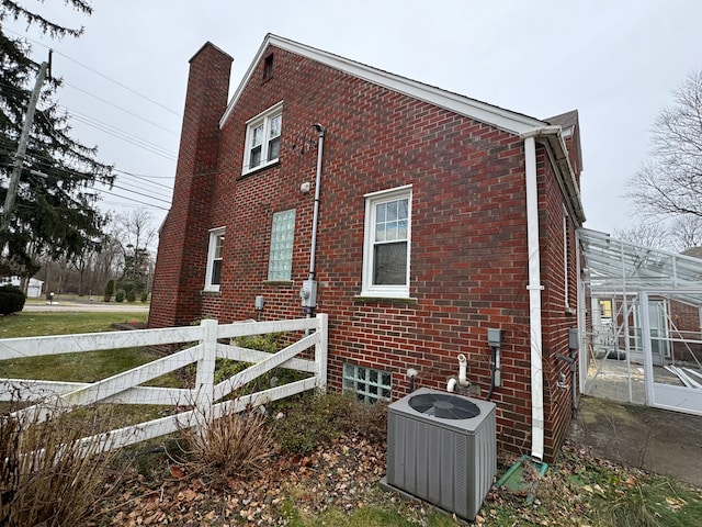 view of property exterior featuring central AC unit