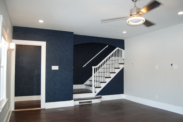 interior space featuring dark hardwood / wood-style floors and ceiling fan