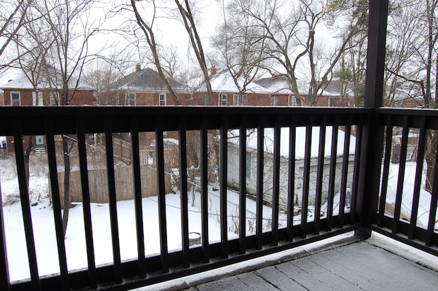 view of snow covered deck