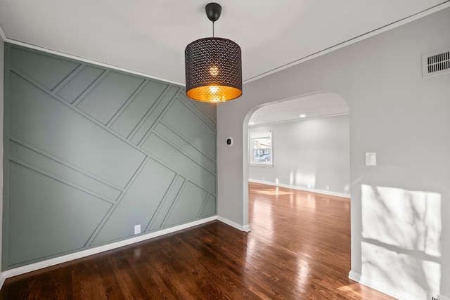 empty room featuring dark hardwood / wood-style floors