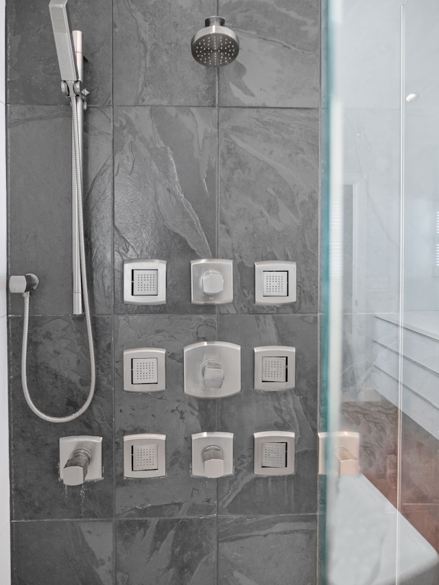 room details with a tile shower