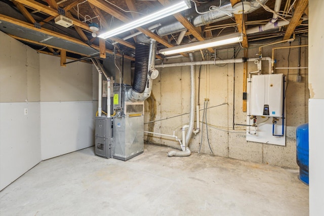 basement featuring heating unit and water heater