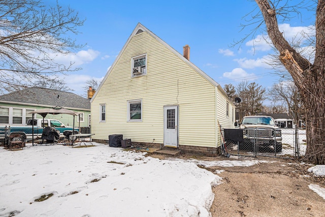 view of snow covered property