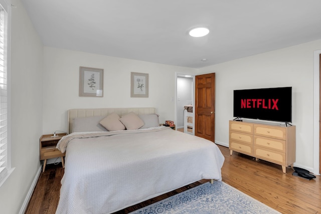 bedroom featuring hardwood / wood-style flooring