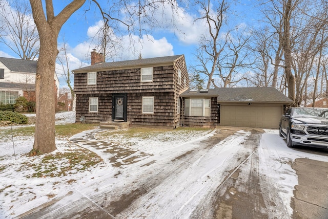 front of property with a garage