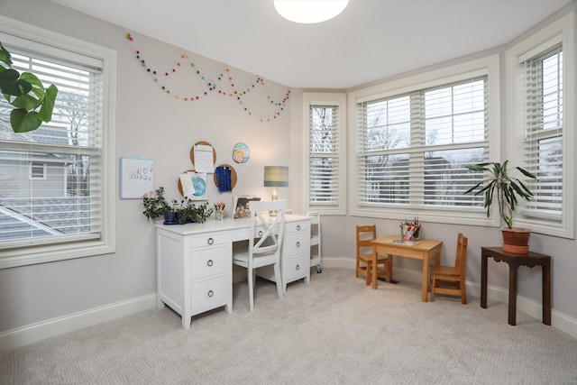 office area with light colored carpet