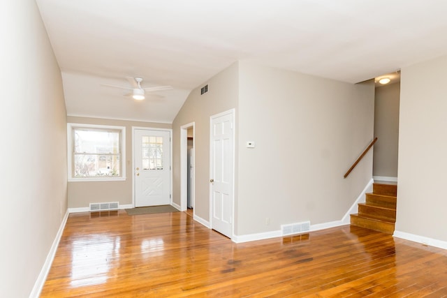 foyer featuring ceiling fan, lofted ceiling, and hardwood / wood-style floors