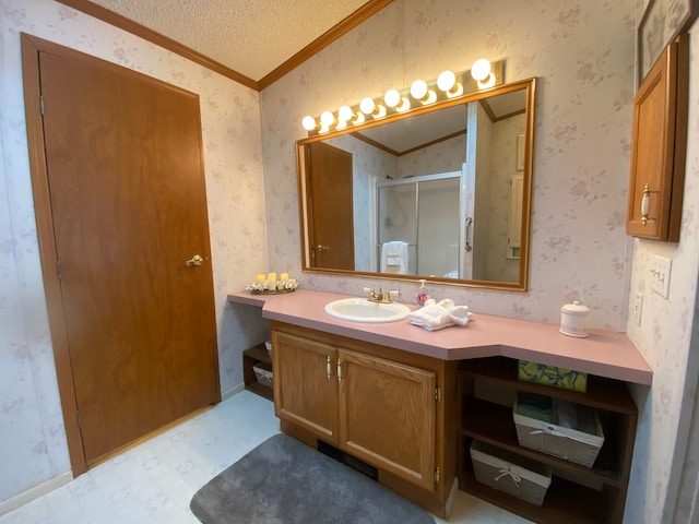 bathroom with lofted ceiling, an enclosed shower, vanity, ornamental molding, and a textured ceiling