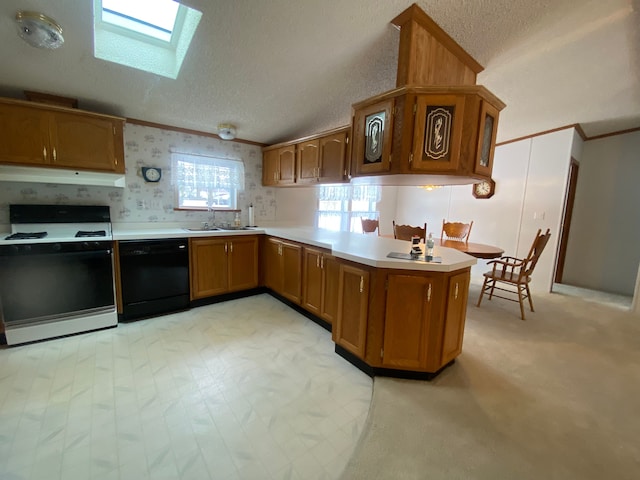 kitchen featuring crown molding, black dishwasher, range, and kitchen peninsula