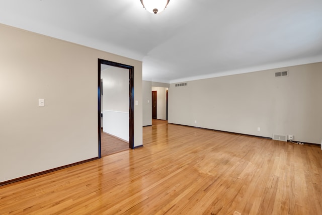 empty room with light wood-type flooring