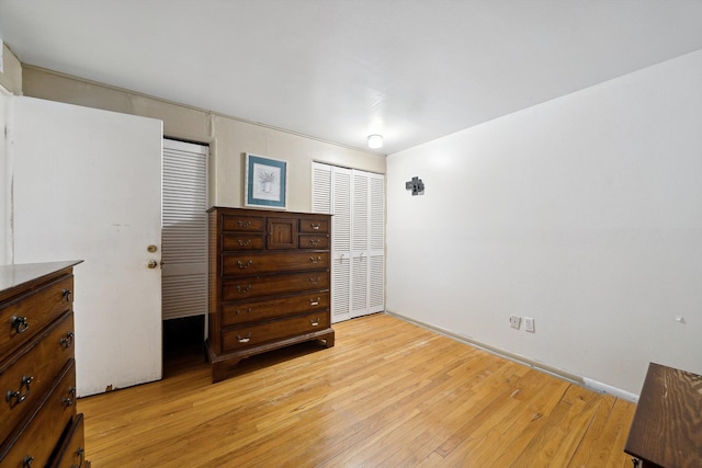 bedroom with light hardwood / wood-style flooring