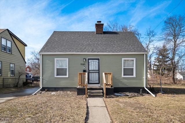 view of front of property with a front lawn