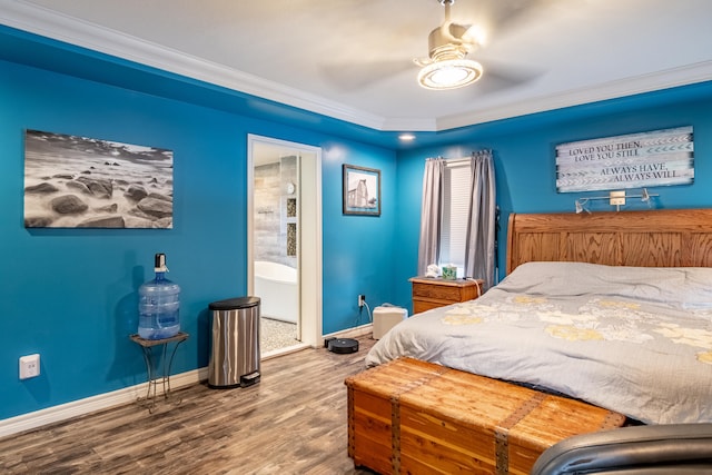 bedroom with ornamental molding, hardwood / wood-style floors, and ceiling fan