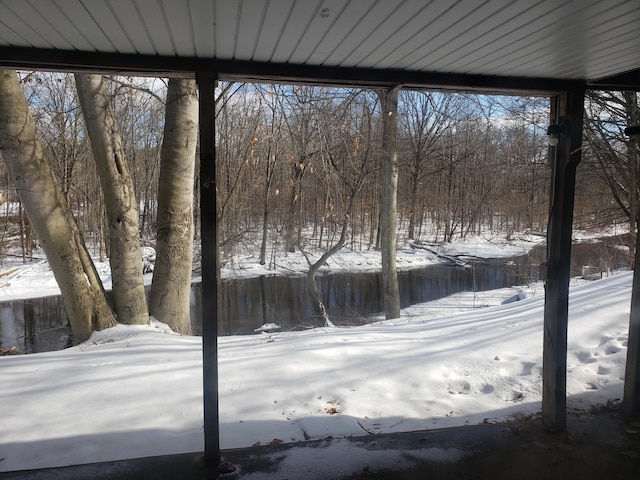 view of yard covered in snow