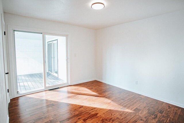 empty room featuring wood-type flooring