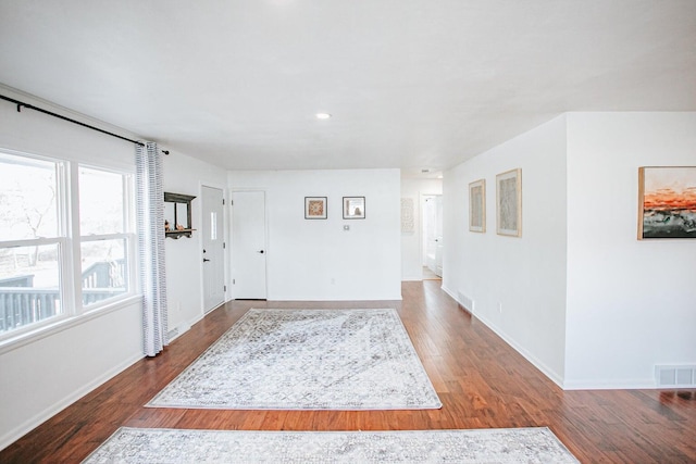 foyer featuring dark hardwood / wood-style flooring