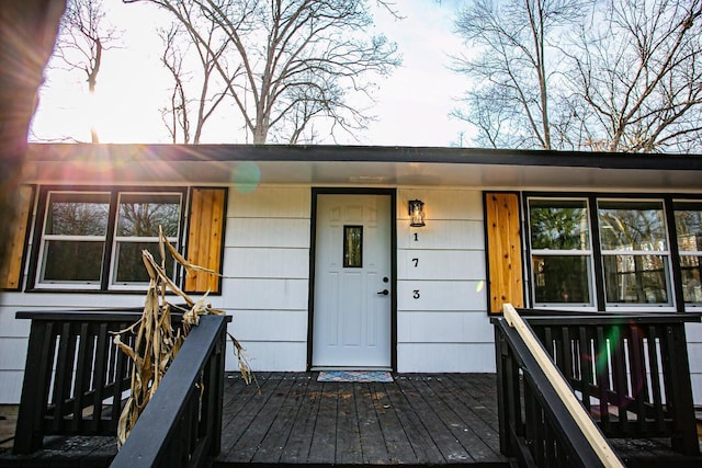 doorway to property with a deck