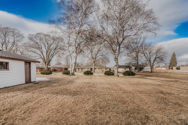 view of yard featuring fence