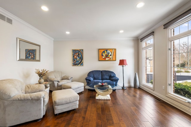 living room with ornamental molding, recessed lighting, dark wood-style flooring, and visible vents