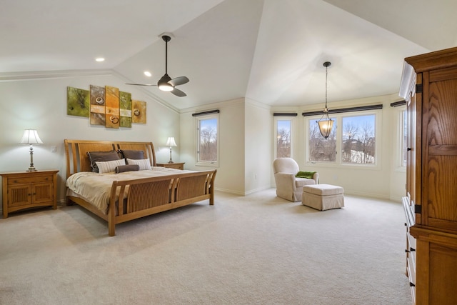 bedroom with lofted ceiling, light carpet, baseboards, and multiple windows