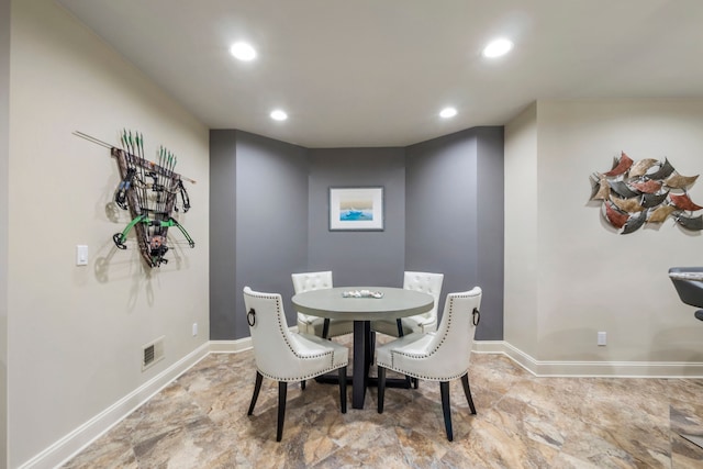 dining room with recessed lighting, visible vents, and baseboards