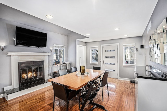 dining area with light hardwood / wood-style floors