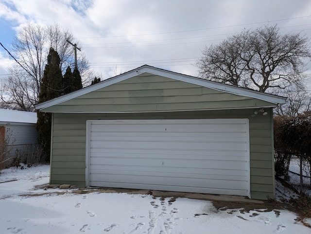 view of snow covered garage