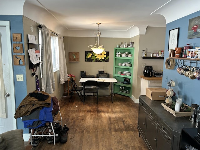 dining space with dark wood-type flooring