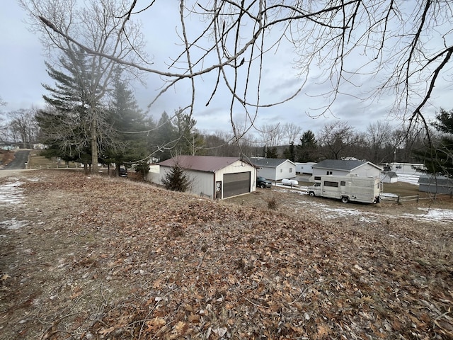 view of yard with a garage